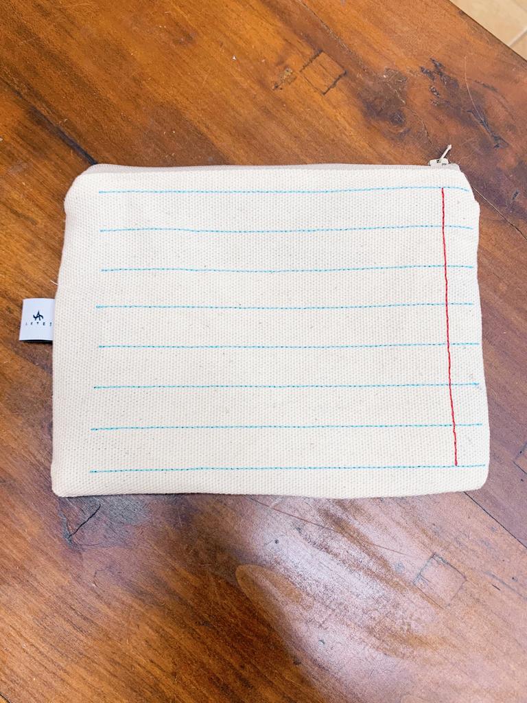 Pochette ricamata quaderno "lascia correre"